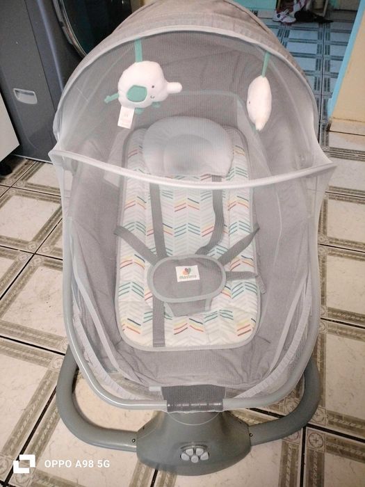 Balansoar electric pentru bebeluși