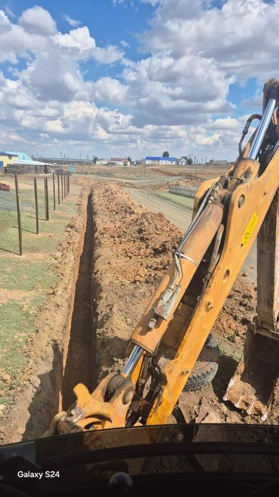 Услуги экскаватора погрузчика