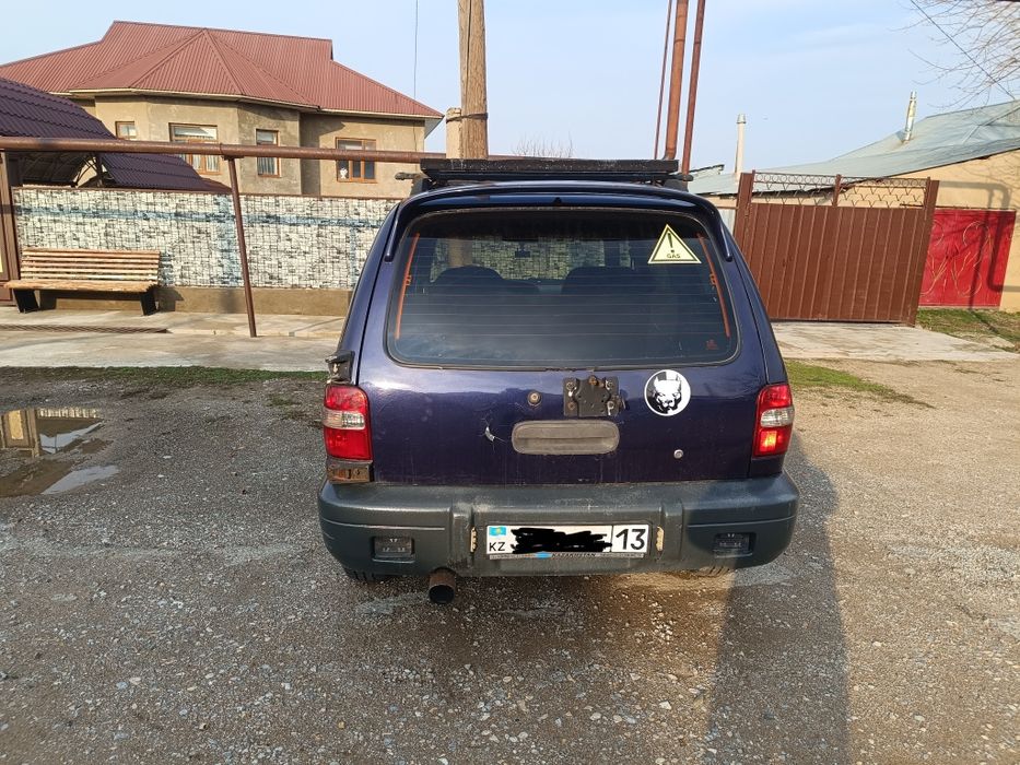 Автомобиль киа спортейж