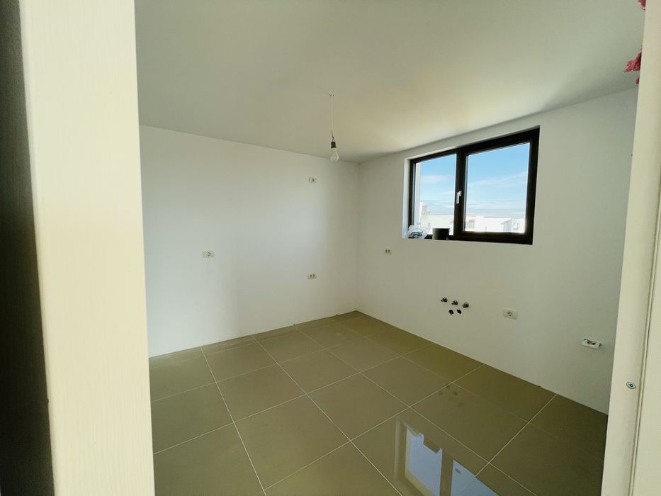 Apartamente cu două camere finalizate , grădină  proprie si parcare