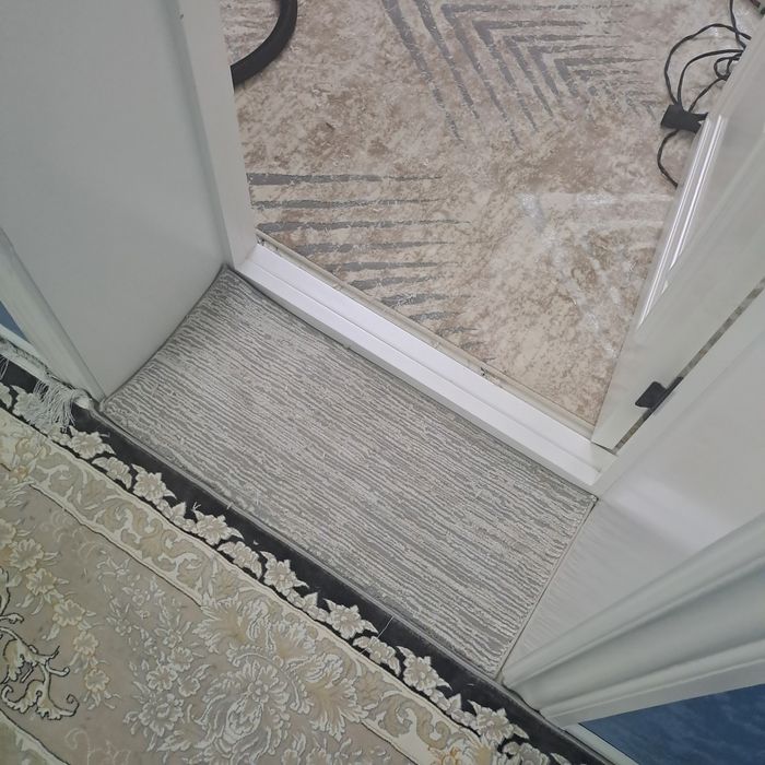 Gilam kesish va tikish