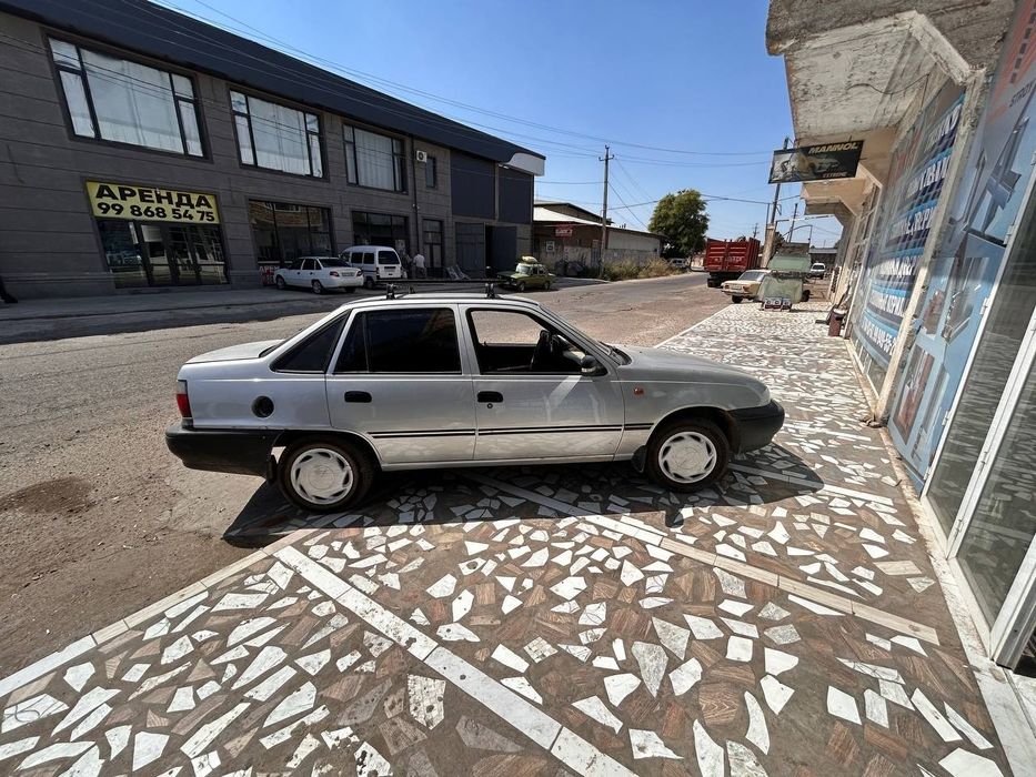 Neksiya 1.  2003 yil bez Rasxod donis .moshina naxadu