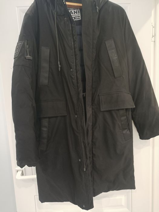 Продам зимний пуховик