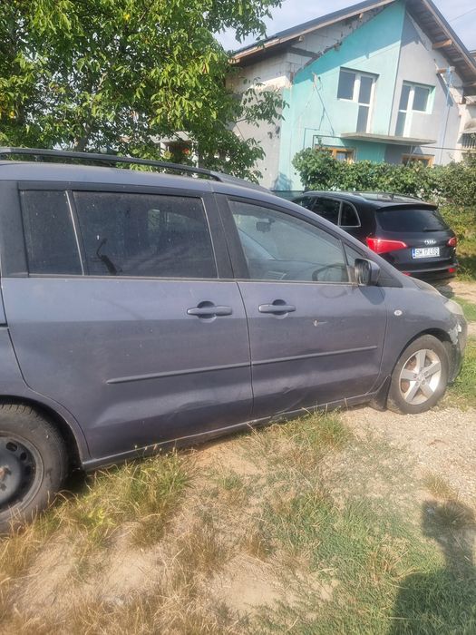 Vând mazda5.  7 locuri