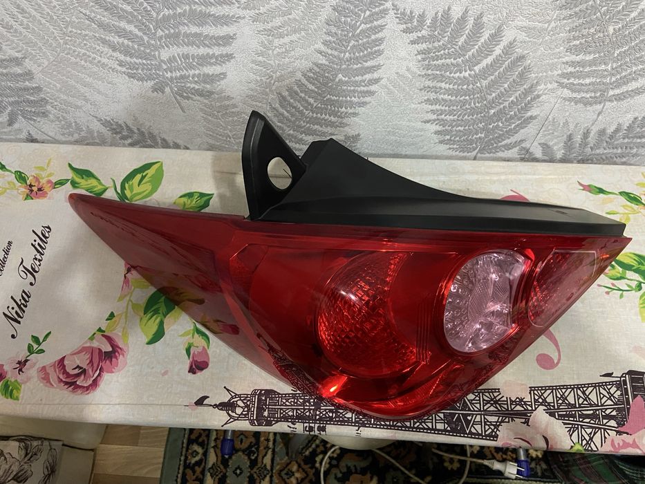 Продам задний левый фонарь тиида