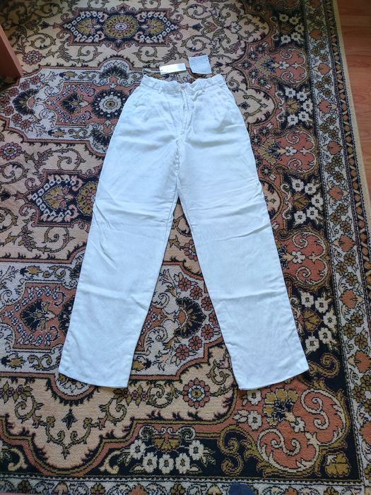 S. Ferré. Pantaloni albi