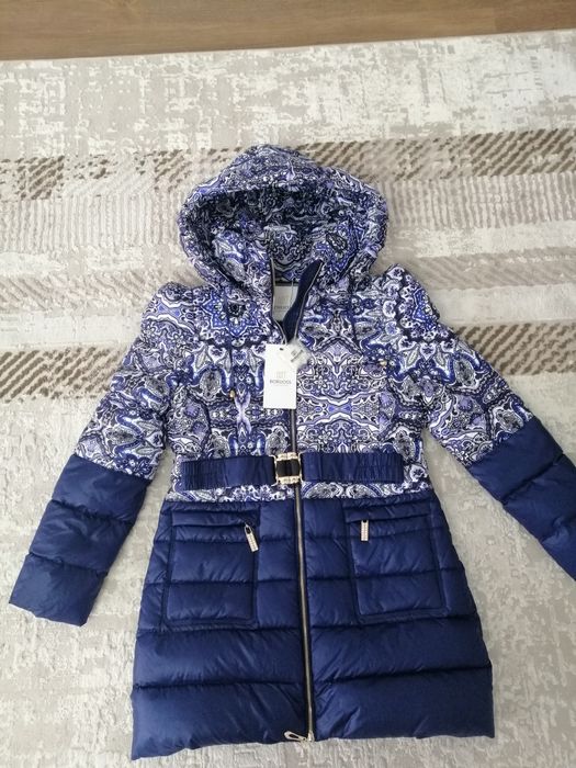 Женские зимные куртки.