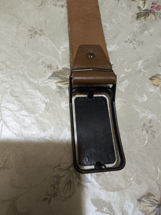 Кожаный ремень .