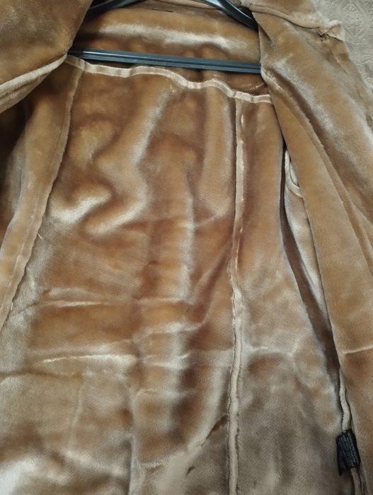 Дамско пухено палтенце