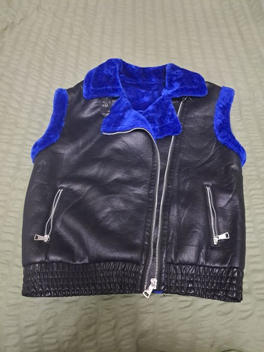 Продам новую кожаную жилетку