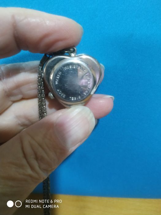 Продаеться кулон - часы