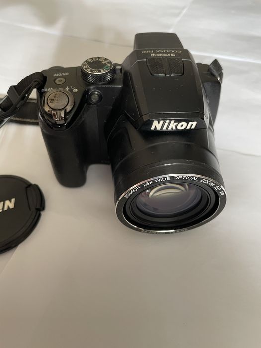 Nikon P100 26x zoom optic,10,3 Mpx,ecran rabatabil, afisare data ora