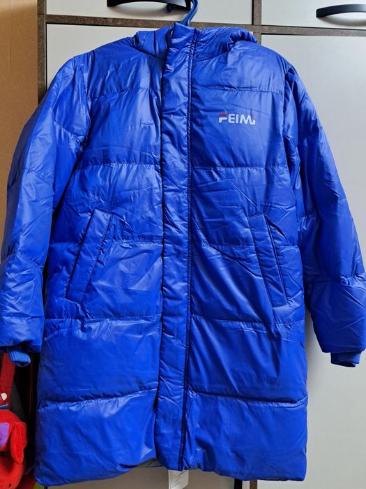 Куртка новая длина 84см.