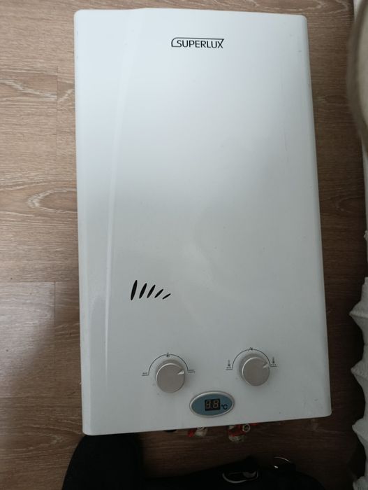 Продам газовый проточный водонагреватель