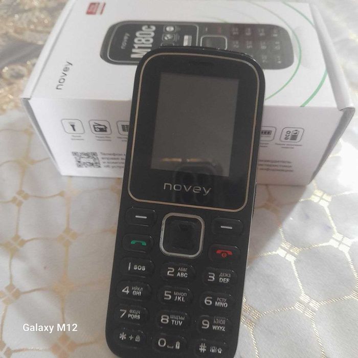 Кнопочный телефон