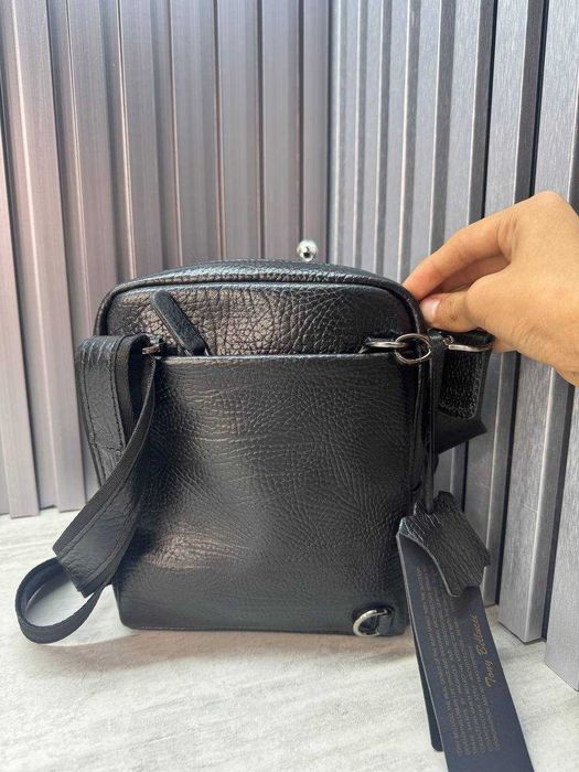 Tony bellucci dan erkaklar sumkasi