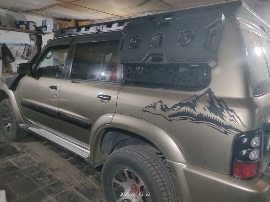 Нисан Патрол 2003 год...