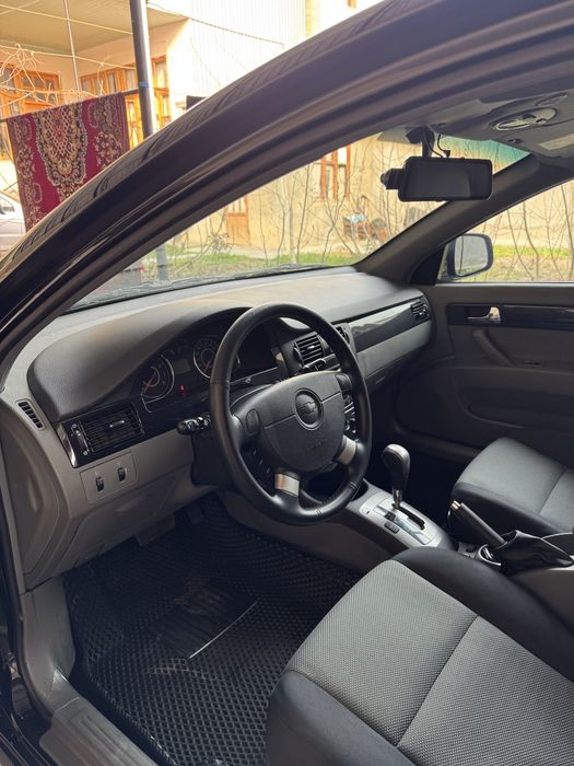 Gentra sotiladi 2023  qora 3 poz