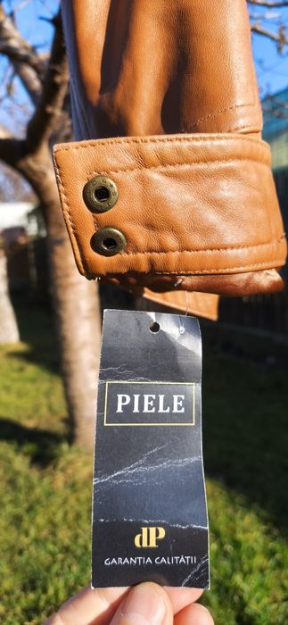 Haina noua ,scurta ,din piele naturala mărimea 42-44