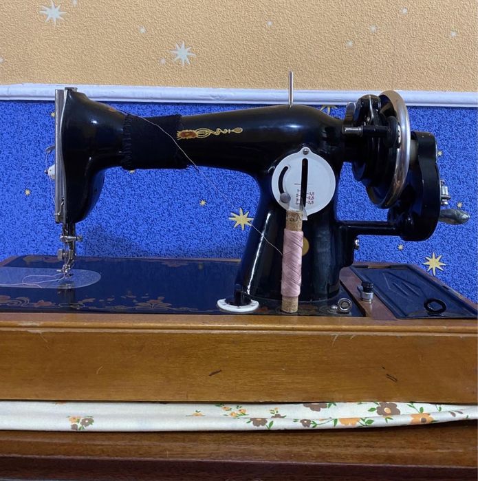 Швейнаямашина с крышкой