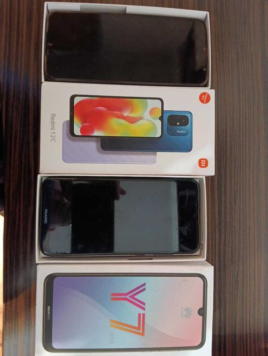 Telefoane mobile Huawei si Xiaomi