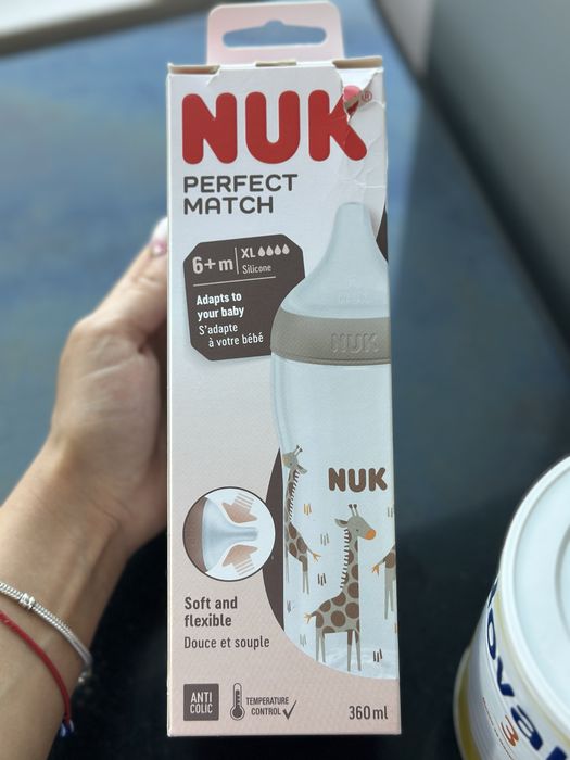 Стерилизатор с 5 функции и шише NUK