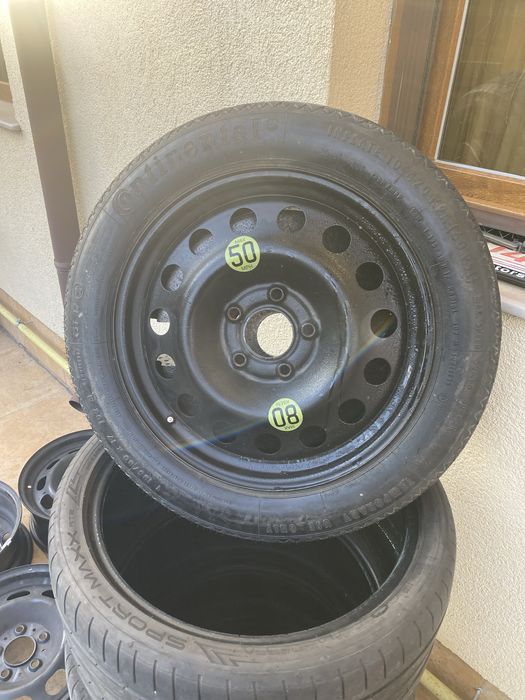 Vind rezerva bmw slim pentru bmw  in stare buna