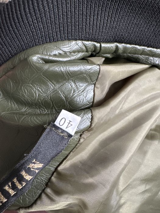 Кожанка новая