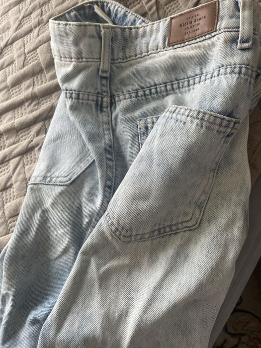 Продам голубые джинсы