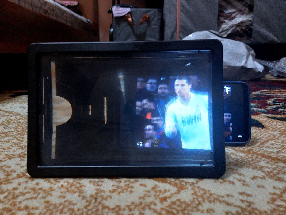 Экран 3D telefon kattalashtirgichi