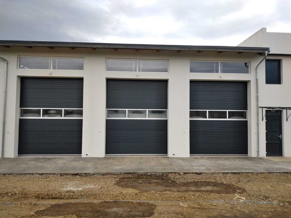 Uși garaj secționale izolate – comandă rapidă Marketroll