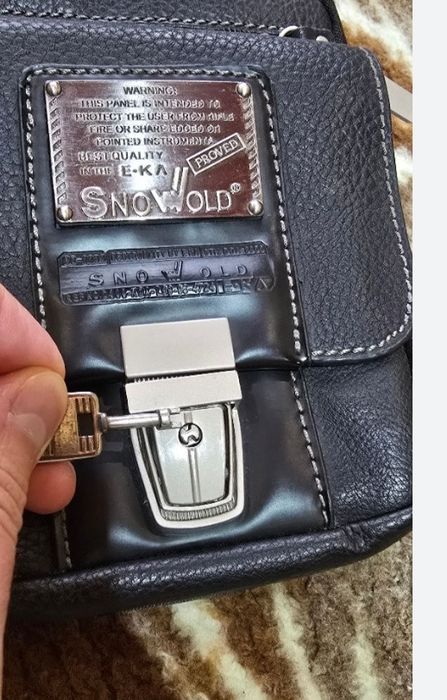 Мужская.Стильная,компактная и вместительная барсетка.