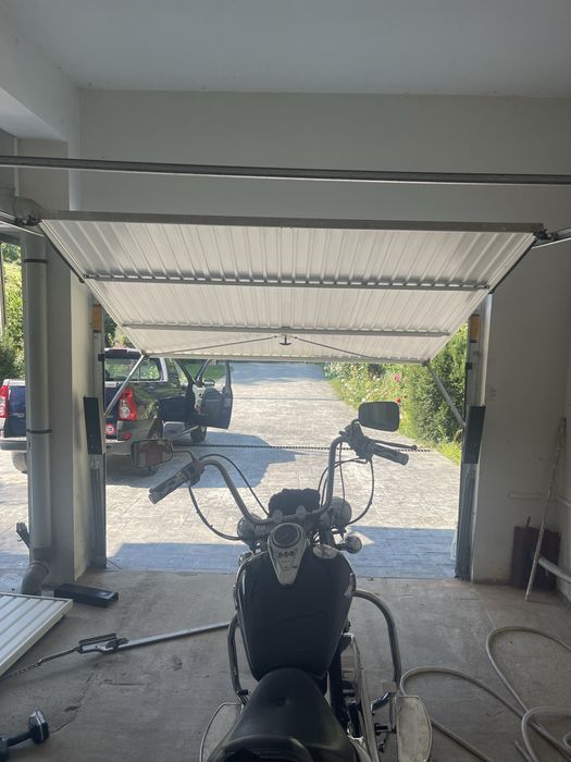 Usa de garaj latime 2,6 m inaltime 2,3 m , sh , manuala , cu incuiere
