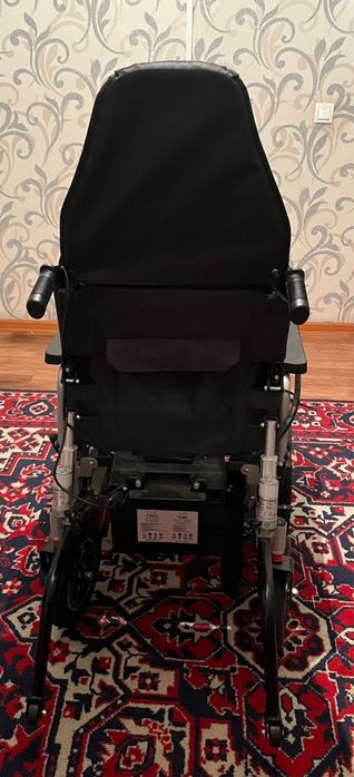 Электрическая инвалидная коляска