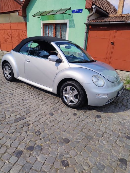 Vănd , schimb VW Beetle Cabrio 1.6 benzină din 2005