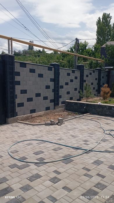 Кладка забора узбеки