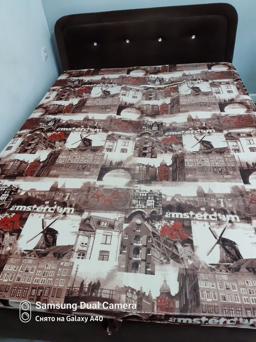 Диван с пуфиком и подушками