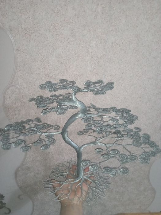 Sun'iy daraxt.Simdan yasalgan.Uzunligi taxminan 40cm.