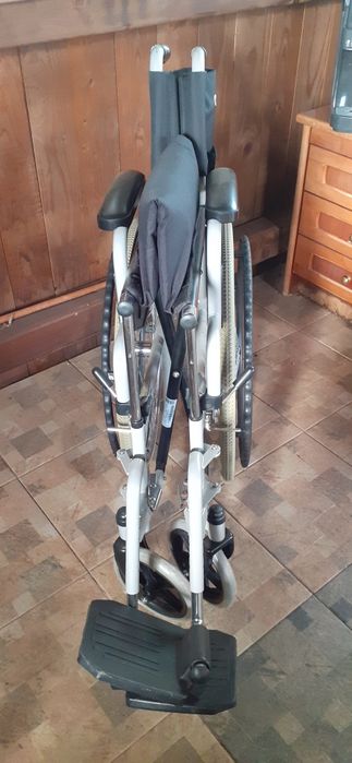 Căruț pentru persoane cu dizabilități