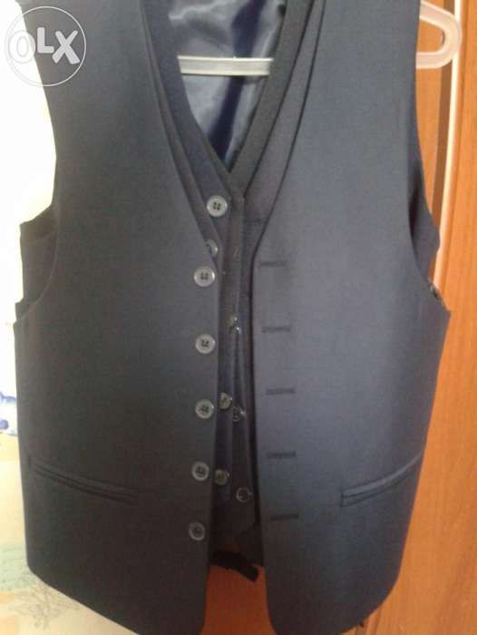 Пиджак б/у и жилетка новая школьные для 1-5 класса