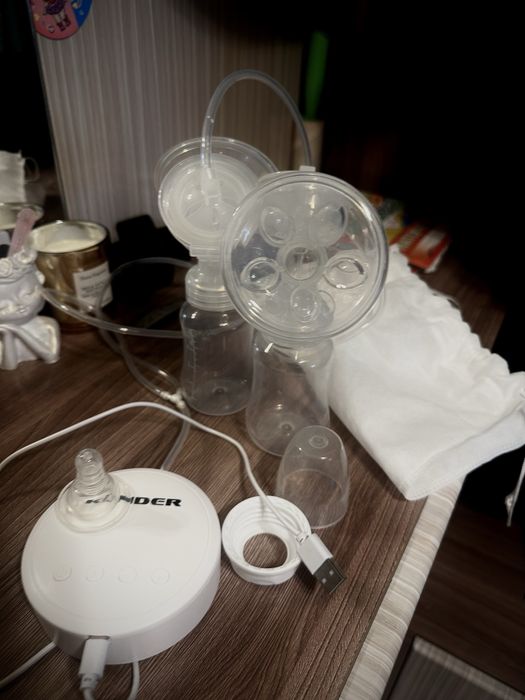 Электрический молокоотсос