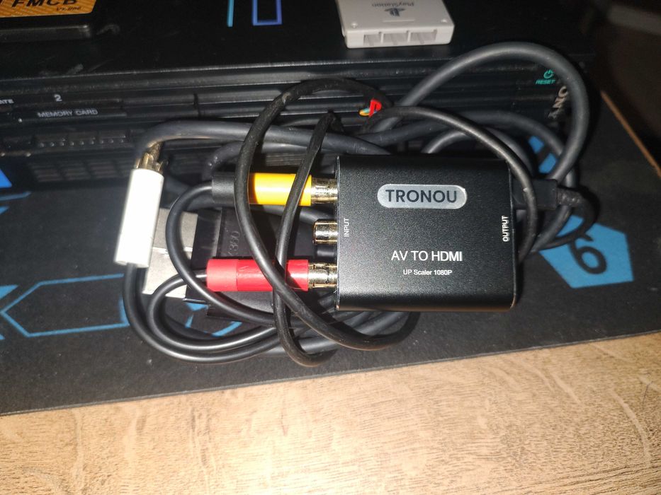 PlayStation 2 Fat SCPH-39004 (Modat) + 2 controllere + FMCB + 4 jocuri + Convertor HDMI