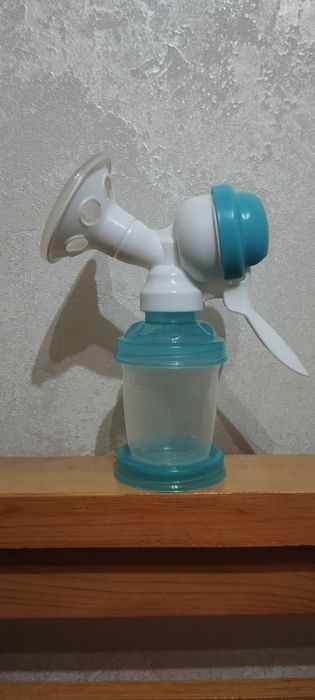 Молокоотсос механический