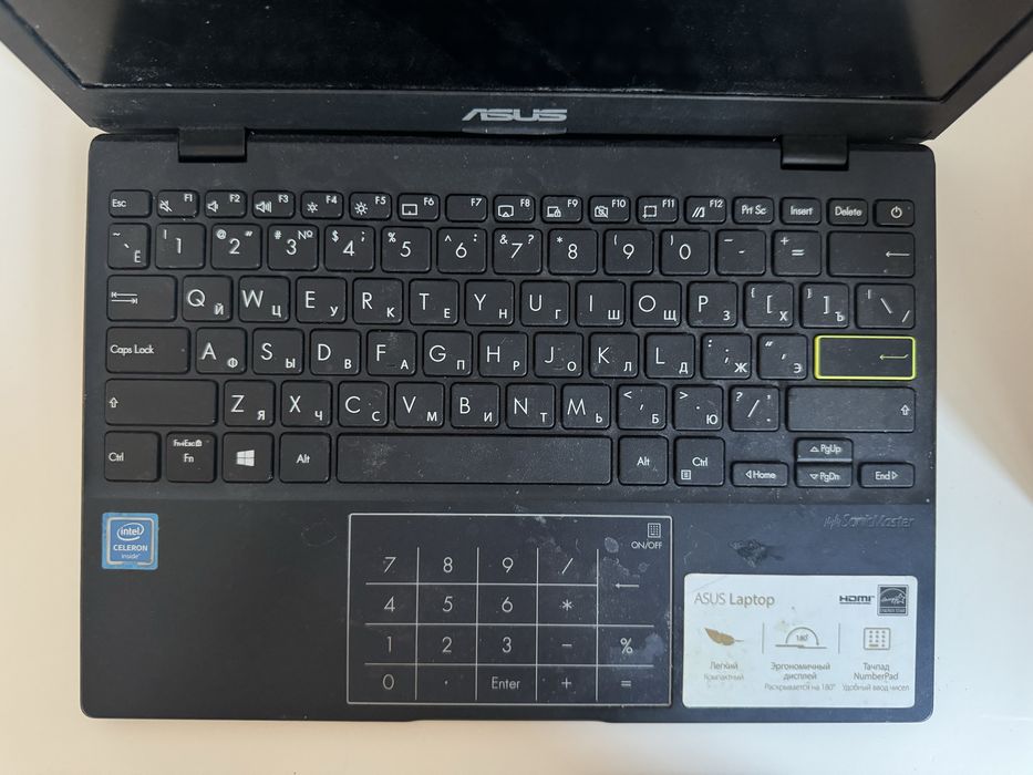 Это ноутбук ASUS E210M (модель E210MA-GJ320T