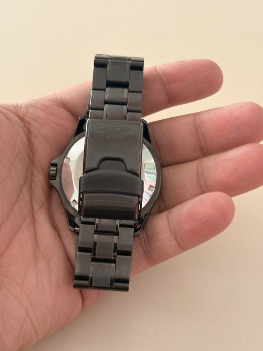 Orient Ray Raven Black PVD coated new with papers