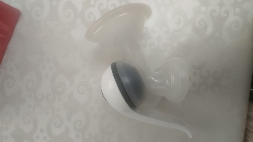 Молокоотсос фирма NUK