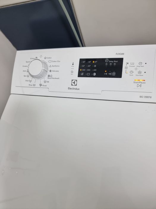 Mașina de spălat verticală electrolux
