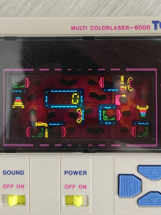 Consola de colecție TOMY/Grandstand Monster Burger LSI Game, din 1983