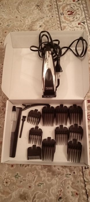 Машинка для стрижки волос.