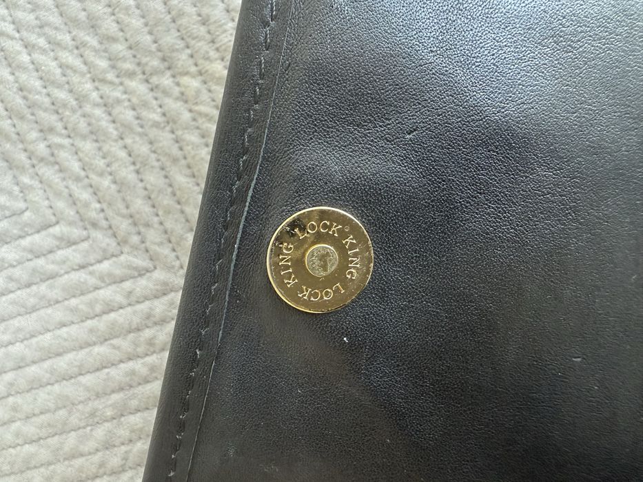 Кожанный клатч Derimod